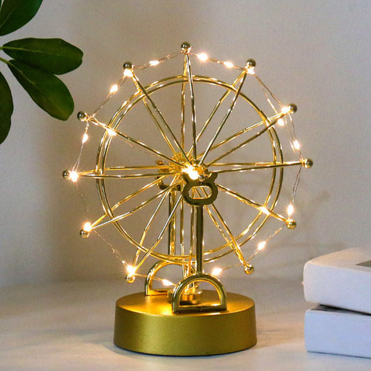 Pariserhjul med roterande evighetsmaskin och lampor för hem- och kontors dekorationer
