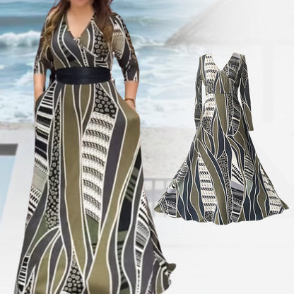 Eleganta Stretchig Klänning med Högt Midje- och V-ringning i Blommigt Mönster