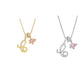 Halsband med initialbokstav och rosa hjärtcharm