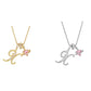 Halsband med initialbokstav och rosa hjärtcharm