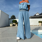 Tvådelat set med enfärgad off shoulder-topp och byxor med vida ben för kvinnor