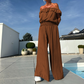 Tvådelat set med enfärgad off shoulder-topp och byxor med vida ben för kvinnor
