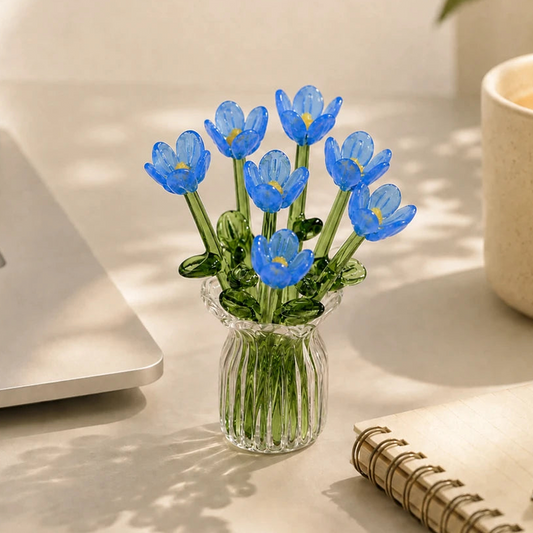 Små glasblommor i färgat glas