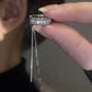 Minimalistisk öronmanschett med strass och tofs