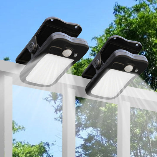 Solcellsdriven rörelsesensorlampa med klämfäste