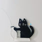 Kylskåpsmagnet med svart katt