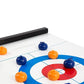 Curlingspel på bordet